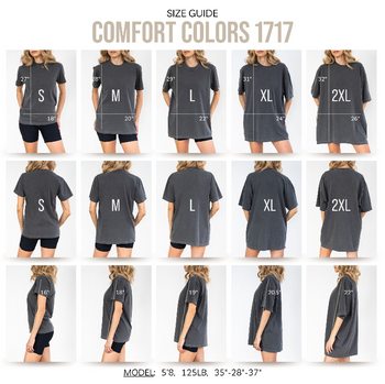 Size guide chart showing front and back views of a dark gray Comfort Colors 1717 t-shirt in various sizes (S, M, L, XL, 2XL) modeled on women, with height and width measurements labeled on each view.